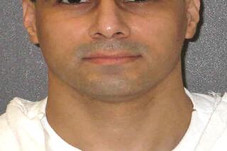 This undated photo provided by the Texas Department of Criminal Justice shows Ruben Gutierrez. Another Texas inmate has had his scheduled execution delayed over claims the state is violating his religious freedom by not letting his spiritual adviser lay hands on him at the time of his lethal injection. Gutierrez had been set to be executed on Oct. 27 for fatally stabbing an 85-year-old Brownsville woman in 1998. But a judge on Wednesday granted a request by the Cameron County District Attorney's Office to vacate the execution date. (Texas Department of Criminal Justice via AP)