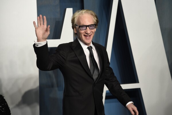 FILE - Bill Maher arrives at the Vanity Fair Oscar Party in Beverly Hills, Calif., on March 27, 2022. Mahr has delayed returning to his HBO talk show during the ongoing strike by writers and actors, a decision following similar pauses in the past few days by “The Drew Barrymore Show,” “The Talk” and “The Jennifer Hudson Show.” (Photo by Evan Agostini/Invision/AP, File)