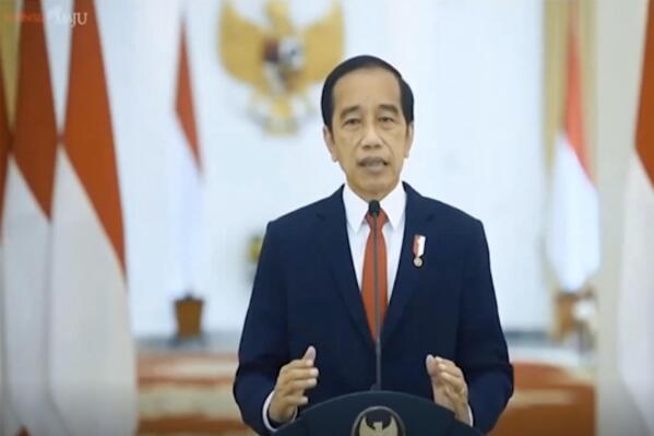 In this image made from video released by ASEAN Business Advisory Council Brunei, Indonesian President Joko Widodo speaks during the ASEAN Business and Investment summit in Jakarta, Indonesia, Monday, Oct. 25, 2021. Widodo has urged Southeast Asian countries to speed up plans to create a regional travel corridor to help revive tourism and speed up a recovery from the economic damage of the pandemic. (ASEAN Business Advisory Council Brunei via AP)