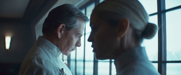 Ben Mendelsohn, left, and Denise Gough in a scene from "Andor." (Lucasfilm Ltd./Disney via AP)