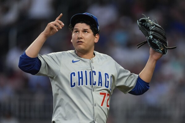 Chicago Cubs pitcher Javier Assad reacts after getting the final out in the fourth inning of a baseball game against the Atlanta Braves Wednesday, May 15, 2024, in Atlanta. (AP Photo/John Bazemore)