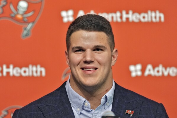 2024 Tampa Bay Buccaneers first round draft pick Graham Barton speaks to the media during an NFL football news conference Friday, April 26, 2024, in Tampa, Fla. Barton played his college football at Duke. (AP Photo/Chris O'Meara)
