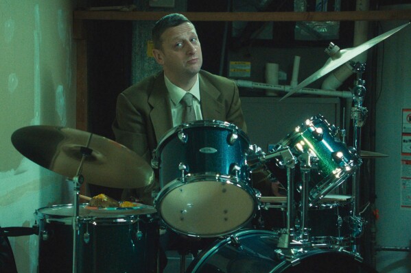 This image released by A24 shows Tim Robinson in a scene from 