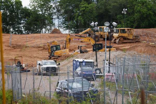 Bulldozers and heavy trucks are clearing the future site of the Atlanta Public Safety Training Center, May 30, 2023, in Atlanta. (Miguel Martinez/Atlanta Journal-Constitution via AP, File)
