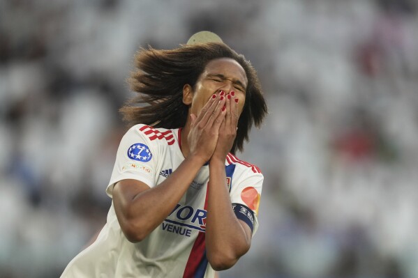 FILE - Olympique Lyon's Wendie Renard celebrates at the end of the Women's Champions League final soccer match between Barcelona and Olympique Lyonnais at Allianz Stadium in Turin, Italy, Saturday, May 21, 2022. The Women's World Cup , co-hosted by New Zealand, kicks off on July 20, which is also when Renard turns 33. She has played 144 internationals and scored 34 goals for France. (Spada/LaPresse via AP, File)