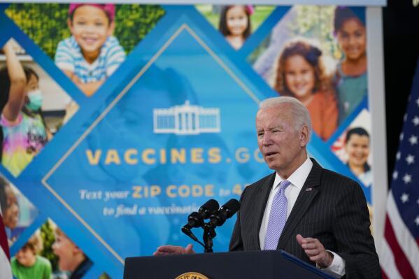 FILE - President Joe Biden talks about the newly approved COVID-19 vaccine for children ages 5-11 from the South Court Auditorium on the White House complex in Washington, Wednesday, Nov. 3, 2021. On Friday, Dec. 17, 2021, a federal appeals court panel allowed President Joe Biden's COVID-19 vaccine mandate for larger private employers to move ahead. (AP Photo/Susan Walsh, File)
