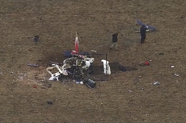 This image from video provided by KOCO shows the scene of a helicopter crash in western Oklahoma on Jan. 20, 2024. A dead goose was found in part of the flight control system of a medical helicopter that crashed in western Oklahoma, killing all three people on board, according to a preliminary report by the National Transportation Safety Board, Saturday, Feb. 3.(KOCO-5 via 麻豆传媒app)