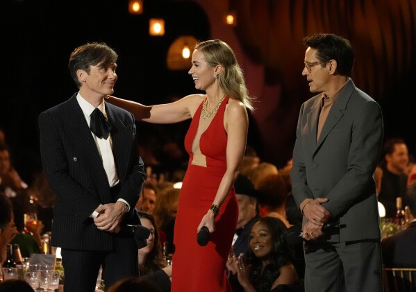 Cillian Murphy, from left, Emily Blunt, and Robert Downey Jr., present a segment from 