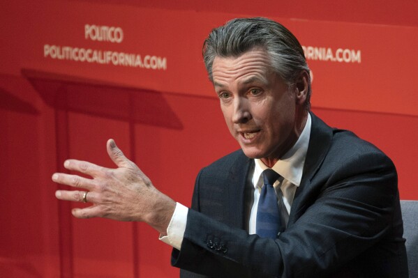 California Gov. Gavin Newsom speaks during an interview with Politico in Sacramento, Calif., Tuesday, Sept. 12, 2023. Newsom said the state will intervene in an ongoing federal court case that has barred San Francisco from cleaning up homeless encampments. (AP Photo/Rich Pedroncelli)