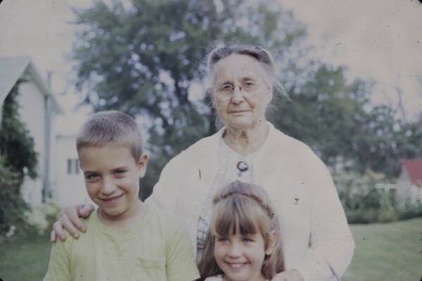 This photo provided by Michael Liedtke shows him with his sister, Diane, and their great grandmother, Beatrice Lyons, in Stuart, Iowa in the late 1960s. (James Liedtke via AP)