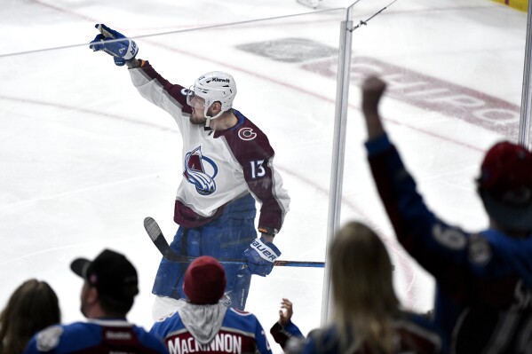 Colorado Avalanche's Valeri Nichushkin (13) celebrates his goal against the Winnipeg Jets during the first period in Game 5 of an NHL hockey Stanley Cup first-round playoff series in Winnipeg, Manitoba, Tuesday April 30, 2024. (Fred Greenslade/The Canadian Press via AP)