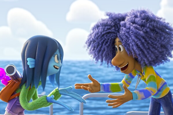 This image released by Universal Pictures shows Ruby Gillman, voiced by Lana Condor, and Connor, voiced by Jaboukie Young-White) in DreamWorks Animation's "Ruby Gillman Teenage Kraken." (Universal Pictures via AP)