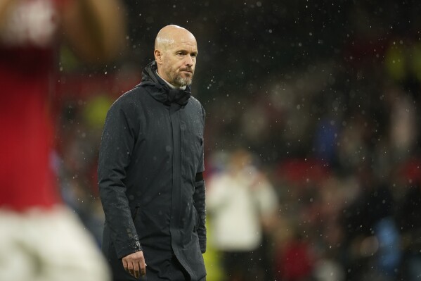 Manchester United's head coach Erik ten Hag walks on the field after the English Premier League soccer match between Manchester United and Manchester City at Old Trafford stadium in Manchester, England, Sunday, Oct. 29, 2023. Manchester City won 3-0. (AP Photo/Dave Thompson)