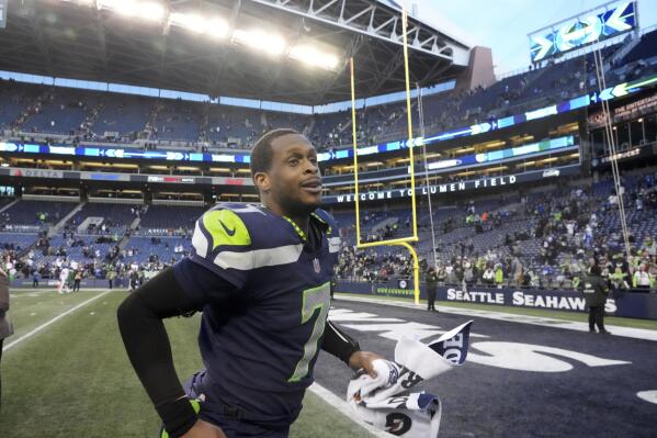 Seattle Seahawks quarterback Geno Smith (7) leaves the field after an NFL football game against the New York Jets, Sunday, Jan. 1, 2023, in Seattle. The Seahawks defeated the Jets 23-6. (AP Photo/Ted S. Warren)