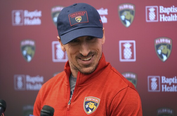 Injured Brad Marchand returns to the Boston ice with the Panthers — but  just in practice, for now | AP News