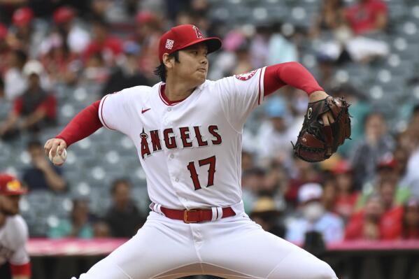Los Angeles Angels pitcher Shohei Ohtani throws to home plate during the first inning of a baseball game against the Seattle Mariners, Sunday, Sept. 26, 2021, in Anaheim, Calif. (AP Photo/Michael Owen Baker)