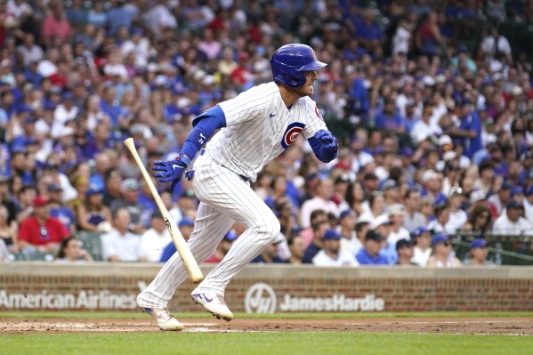 MINNEAPOLIS, MN - MAY 14: Chicago Cubs Shortstop Dansby Swanson (7)  celebrates his double during a MLB game between the Minnesota Twins and  Chicago Cubs on May 14, 2023, at Target Field