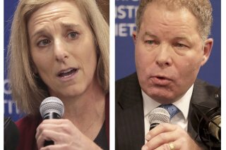 FILE - This combination of Nov. 19, 2019 file photos shows Dane County Circuit Court Judge Jill Karofsky, left, and Wisconsin Supreme Court Justice Daniel Kelly, during a candidate's forum for a seat on the state Supreme Court. Clerks will begin counting ballots Monday, April 13, 2020, nearly a week after votes were cast in Wisconsin's contentious Supreme Court race. (John Hart/Wisconsin State Journal via AP, File)