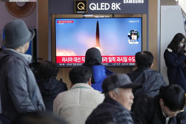 A TV screen shows a file image of North Korea's missile launch during a news program at the Seoul Railway Station in Seoul, South Korea, Monday, March 18, 2024. North Korea fired multiple short-range ballistic missiles toward its eastern waters Monday morning, its neighbors said, days after the end of the South Korean-U.S. military drills that the North views as an invasion rehearsal. (AP Photo/Ahn Young-joon)