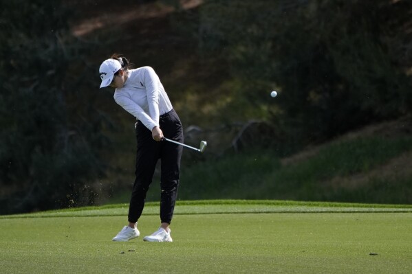Rose Zhang hits from the ninth fairway during the second round of the LPGA T-Mobile Match Play golf tournament Thursday, April 4, 2024, in North Las Vegas, Nev. (AP Photo/John Locher)