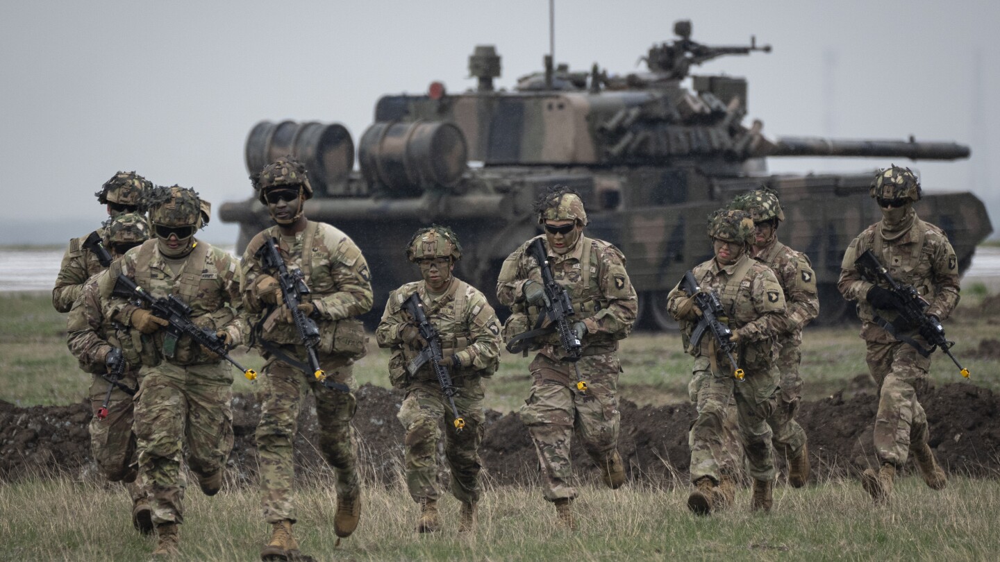 NATO readies military plans to defend against bruised but unbowed