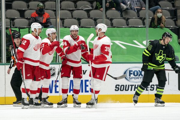 Detroit Red Wings' Patrik Nemeth, Valtteri Filppula, Bobby Ryan and Anthony Mantha, from left, celebrate Filppula's goal against the Dallas Stars during the second period of an NHL hockey game Thursday, Jan. 28, 2021, in Dallas. (AP Photo/Jeffrey McWhorter)
