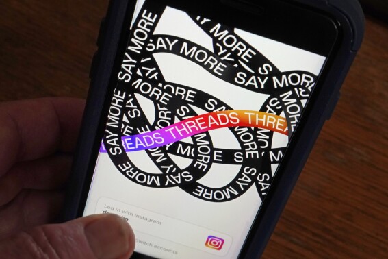 File - Meta's new app Threads is displayed on a smartphone in New York, Thursday, July 6, 2023. Meta CEO Mark Zuckerberg said in a Threads post, Tuesday, Aug. 22, 2023, that a web version of the app will be rolling out over the next few days. (AP Photo/Richard Drew, File)