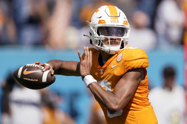 FILE -Tennessee quarterback Nico Iamaleava throws against Virginia in the second half of an NCAA college football game Saturday, Sept. 2, 2023, in Nashville, Tenn. Quarterback Joe Milton has opted out to prepare for the 2024 NFL draft, leaving freshman Nico Iamaleava to make his first career start for No. 25 Tennessee in the Citrus Bowl on Monday, Jan. 1, 2024. (AP Photo/George Walker IV, File)