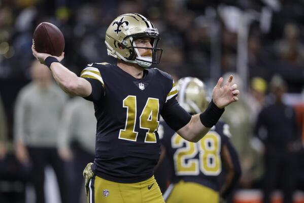 New Orleans Saints quarterback Andy Dalton passes against the Los Angeles Rams in the first half of an NFL football game in New Orleans, Sunday, Nov. 20, 2022. (AP Photo/Butch Dill)