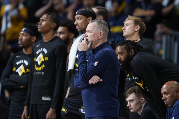 Denver Nuggets head coach Michael Malone looks on as time runs out in the second half of Game 7 of an NBA second-round playoff series against the Minnesota Timberwolves Sunday, May 19, 2024, in Denver. (AP Photo/David Zalubowski)