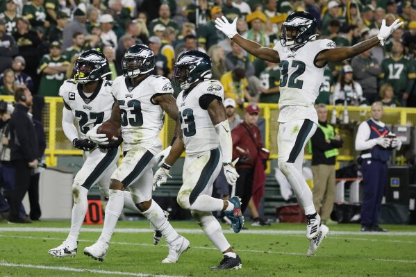 Eagles pick off Rodgers' late pass, beat Packers 34-27
