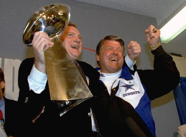 Dallas Cowboys head coach Jimmy Johnson displays his Super Bowl XXVII championship  ring on Wednesday, June 3, 1993 in Irving, Texas. The ring has a dazzling  five-point-shaped diamond in the center with