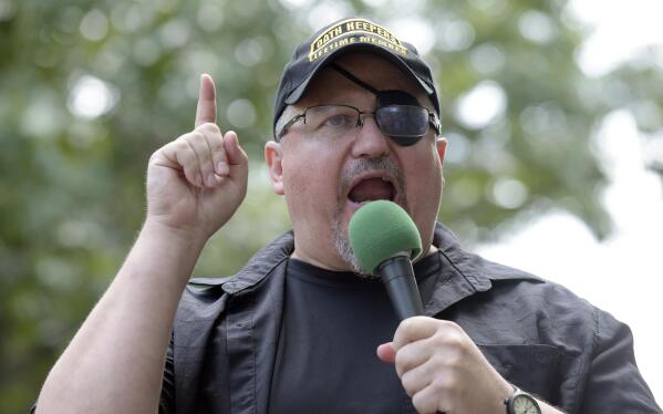 FILE - Stewart Rhodes, founder of the Oath Keepers, speaks during a rally outside the White House in Washington, June 25, 2017. Rhodes has been sentenced to 18 years in prison for seditious conspiracy in the Jan. 6, 2021, attack on the U.S. Capitol. He was sentenced Thursday after a landmark verdict convicting him of spearheading a weekslong plot to keep former President Donald Trump in power. (AP Photo/Susan Walsh, File)
