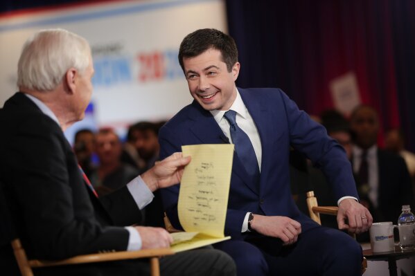 Democratic presidential candidate, former South Bend Mayor Pete Buttigieg is intervened in the spin room after a Democratic presidential primary debate Wednesday, Feb. 19, 2020, in Las Vegas, hosted by NBC News and MSNBC. (AP Photo/Matt York)