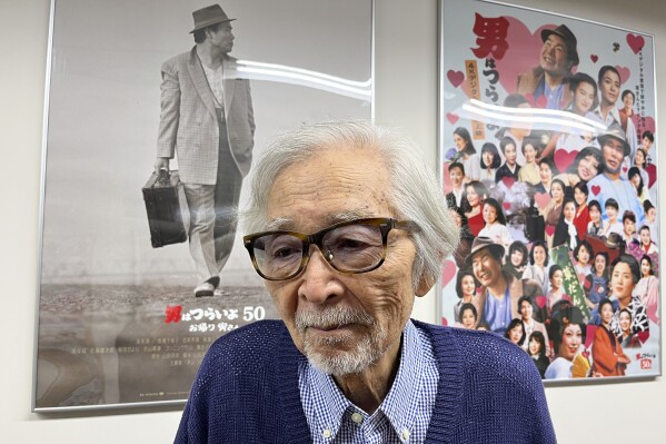 Japanese director Yoji Yamada, who has 90 films to his credit, talks to The Associated Press at a Shochiku office in Tokyo, Wednesday, Oct. 4, 2023. A theater piece he has scripted and directed, based on a storyteller’s classic, is being performed at the Kabukiza in Tokyo through the end of this month. Yamada, 92, says all his works deal with the question of what it truly means to be human. (AP Photo/Yuri Kageyama)