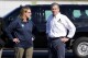 North Carolina Gov. Roy Cooper, right, and Deanne Criswell, Administrator of the U.S. Federal Emergency Management Agency, await the arrival of Democratic presidential nominee Vice President Kamala Harris for a briefing on the damage from Hurricane Helene, at Charlotte Douglas International Airport, Saturday, October 5, 2024, in Charlotte, N.C. (AP Photo/Chris Carlson)