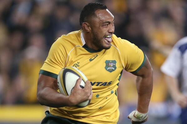 FILE - In this Aug. 8, 2015, file photo, Australia's Sekope Kepu smiles as he crosses the try line to score against New Zealand during their Rugby Championship match in Sydney. Moana Pacifika have signed on Tuesday, Oct. 19, 2021 veteran international prop Kepu in a move which adds considerable experience to their squad for their inaugural season in the Super Rugby Pacific tournament. (AP Photo/Rick Rycroft, File)