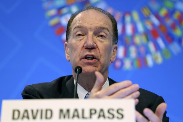 FILE - In this Oct. 17, 2019 file photo, World Bank President David Malpass speaks during a news conference at the World Bank/IMF Annual Meetings in Washington.  The World Bank on Tuesday, Jan. 5, 2021 forecast that the global economy will see a subdued recovery this year from a devastating pandemic but warned that the near-term outlook is highly uncertain and growth could be harmed if infections keep rising and the rollout of vaccines is delayed.(AP Photo/Jose Luis Magana, File)