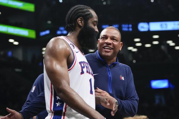 Philadelphia 76ers head coach Doc Rivers, right, talks to James Harden during the second half of Game 4 in an NBA basketball first-round playoff series against the Brooklyn Nets, Saturday, April 22, 2023, in New York. (AP Photo/Frank Franklin II)