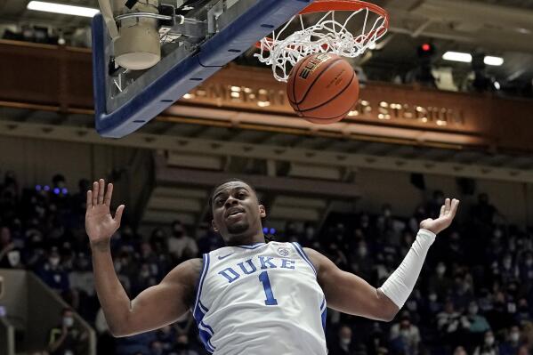 Duke guard Trevor Keels (1) dunks against Elon during the first half of an NCAA college basketball game in Durham, N.C., Saturday, Dec. 18, 2021. (AP Photo/Gerry Broome)