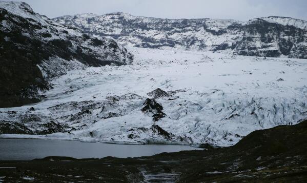 FILE - In this Oct. 26, 2016 file photo, the glacier of Volcano Katla near Vik, Iceland.  After a summer of increased seismic activity at Katla, Icelanders are obsessing over the smallest sign of an eruption at the country’s most closely watched volcano. Katla last erupted in 1918. Never before in recorded history, dating back to the 12th century, have 99 years passed without an eruption from the volcano. (AP Photo/Frank Augstein, File)