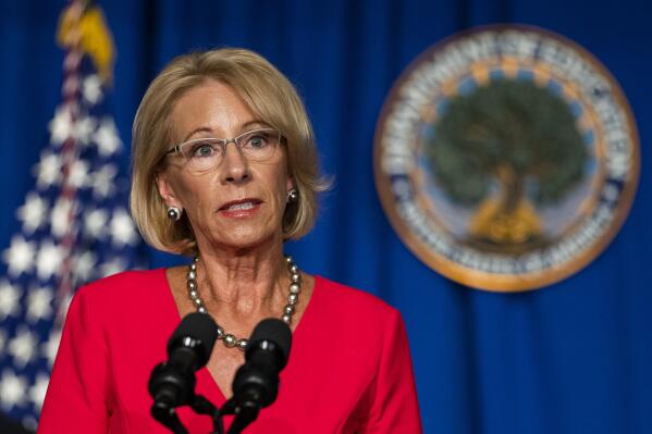 FILE - In this July 8, 2020, file photo, Education Secretary Betsy DeVos speaks during a briefing at the Department of Education building in Washington. DeVos said Tuesday, Aug. 10, 2021, she will not run for Michigan governor in 2022, putting an end to speculation about the onetime Trump administration Cabinet member and partner in one of the state’s most influential Republican couples.  (AP Photo/Manuel Balce Ceneta, File)