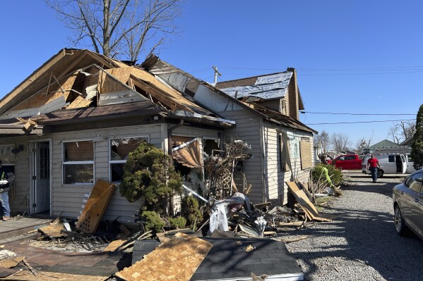 Joe Baker's damaged home in Valleyview, Ohio, on Saturday, March 16, 2024. Thursday night’s storms left trails of destruction across parts of Ohio, Kentucky, Indiana and Arkansas. (AP Photo/Patrick Orsagos)
