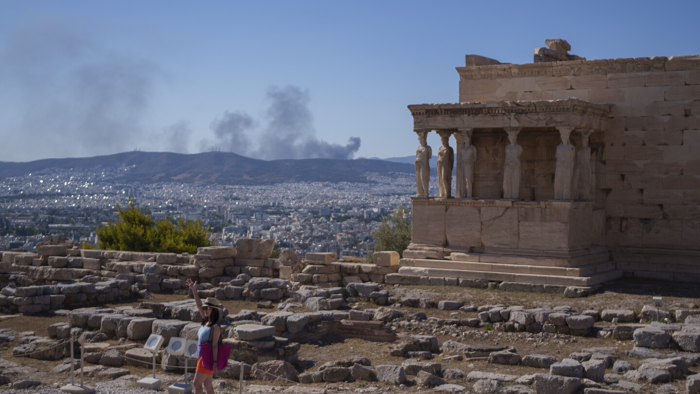 Greece shuts Acropolis, 2 firefighters killed in Italy as southern Europe swelters in a warmth wave