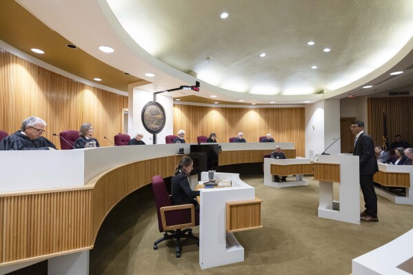 Dale Schowengerdt, representing Montana Gov. Greg Gianforte and state environmental agencies, argues before the Montana Supreme Court, on July 10, 2024, in Helena, Mont., in the youth climate lawsuit Held v. Montana. (Thom Bridge/Independent Record via AP, File)