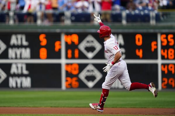 Philadelphia Phillies' Rhys Hoskins runs the bases after hitting a home run off Washington Nationals' Patrick Corbin during the first inning of a baseball game Saturday, Aug. 6, 2022, in Philadelphia. (AP Photo/Matt Rourke)