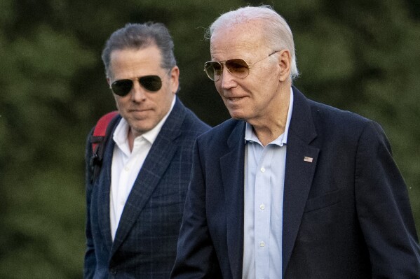 FILE - President Joe Biden, and his son Hunter Biden arrive at Fort McNair, June 25, 2023, in Washington. Republicans have insisted for months that they have the grounds to launch impeachment proceedings against President Biden. On Thursday, they will begin formally making their case to the public and their skeptical colleagues in the Senate.(AP Photo/Andrew Harnik, File)