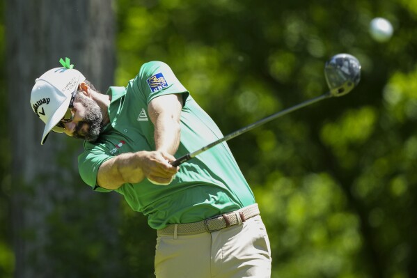 Adam Hadwin tees off on the seventh hole during the first round of Canadian Open golf tournament in Hamilton, Ontario, Thursday, May 30, 2024. (Nathan Denette/The Canadian Press via AP)