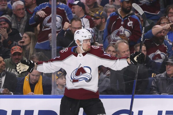 FILE - Colorado Avalanche forward Valeri Nichushkin celebrates his goal during the second period of the team's NHL hockey game against the Buffalo Sabres, Feb. 4, 2020, in Buffalo, N.Y. Nichushkin was suspended and placed in stage 3 of the the league's player assistance program before Game 4 on Monday, May 13, 2024, night of a second-round series with Dallas. (AP Photo/Jeffrey T. Barnes, File)