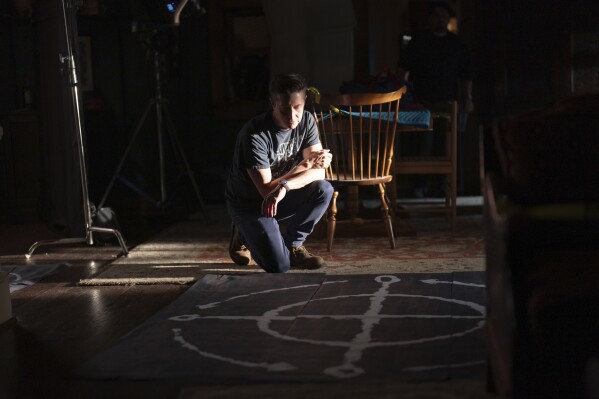 This image released by Universal Pictures shows director David Gordon Green on the set of "The Exorcist: Believer." (Eli Joshua Adé/Universal Pictures via AP)